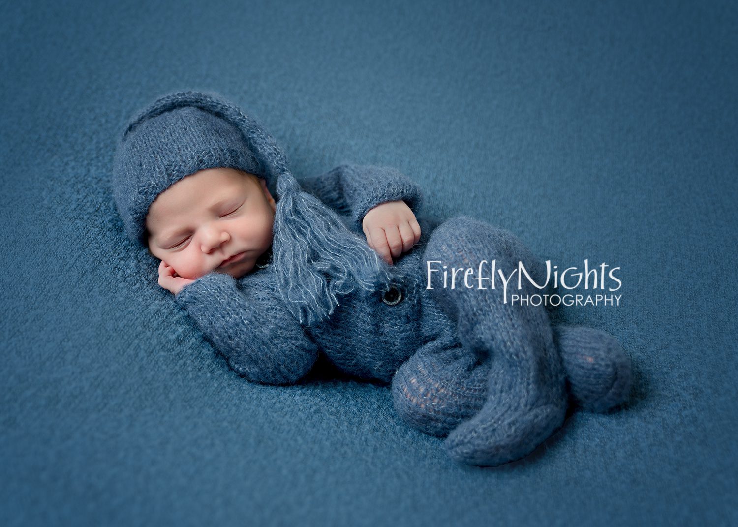 Naperville newborn photographer baby boy in blue wrap