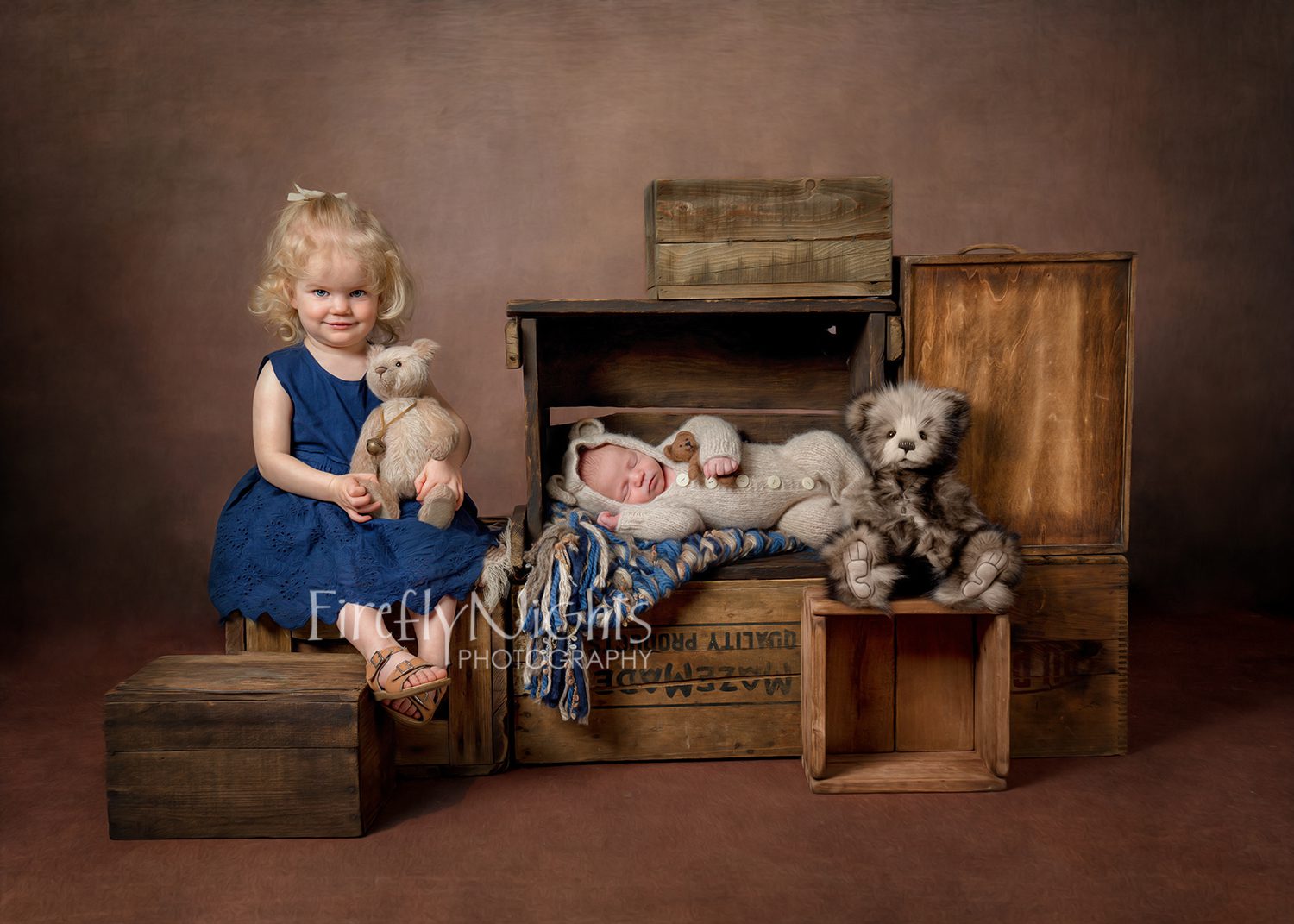 newborn baby with teddy bears